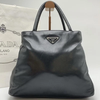 Bolso de Mano PRADA Cuero Napa Negro, Todo Cuero, Con Placa de Logotipo Triangular Foto 1 de 4