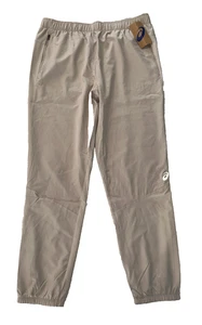 $60 Pantalones Asics Para Hombre Tejidos Elastizados Cremallera Bolsillo para Mano - Beige - Grandes - Etiquetas Nuevas - Imagen 1 de 9