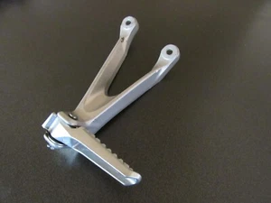 HONDA CBR1000RR RR8 LEFT REAR FOOT PEG AND HANGER 2008 2009 2010 2011. - Picture 1 of 1
