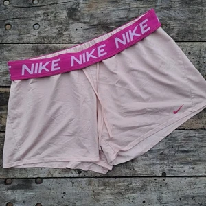 Nike Damen hellrosa Dri-Fit Training Laufen Sport Shorts XL Hose - Bild 1 von 7