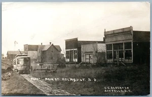 HOLMQUIST S.D MAIN STREET SCENE w/TROLLEY ANTIQUE PHOTOMONTAGE REAL PHOTO RPPC - Picture 1 of 2