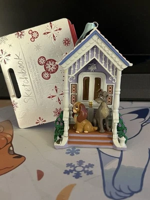 Nuevo Disney Store Dama y El Vagabundo Navidad Cuaderno de Bocetos Adorno 2021 Foto 1 de 4