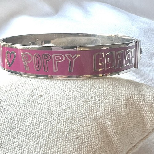 Bracciale Coach smalto rosa fucsia tono argento