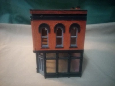 Negocio estilo ladrillo de dos pisos escala Ho. Foto 1 de 4