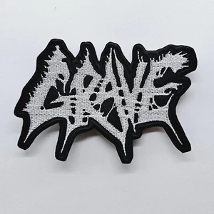PARCHE BORDADO CON LOGOTIPO EN FORMA BLANCA GRAVE - Imagen 1 de 1
