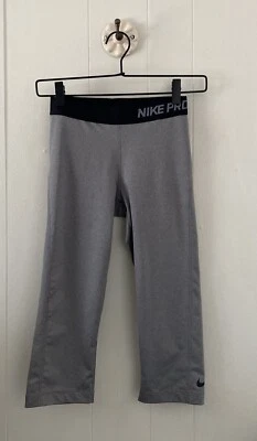 Meia-calça cropped Nike Pro Dri-fit feminina tamanho pequeno treinamento Capri cinza 589366-091 - Imagem 1 de 4