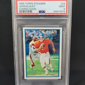 1985 Topps Stickers John Elway #24 Coming Soon - PSA 9 - Picture 1 of 2