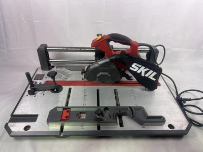 Sierra de suelo SKIL 3601-02 7,0 amperios con hoja de contratista 36t, roja y negra Foto 1 de 4