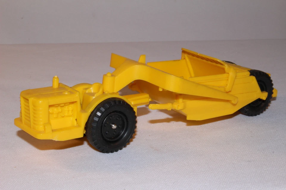 Raspador de plástico Allis-Chalmers años 60, bonito original Foto 1 de 4