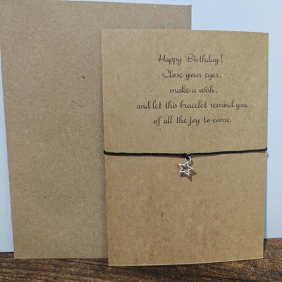 Pulsera de deseos de cumpleaños hecha a mano con dije de plata en cordón negro - ecológica Foto 1 de 4