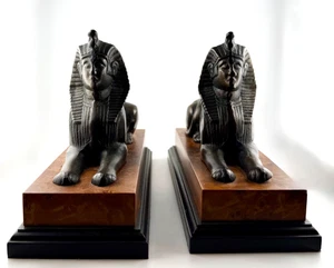 Vintage Egyptian Revival Sphinx Buchstützen Bronze Finish Faux Wood Base Art Deco - Bild 1 von 5
