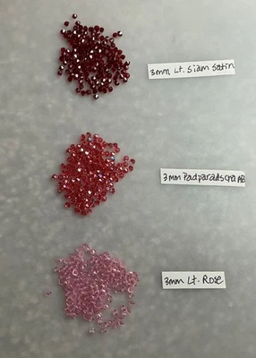 SWAROVSKI  # 5301 BICONE BEADS 3mm Lt. Rose, Padparadscha AB, Lt. Siam Satin 144 - Image 1 of 4