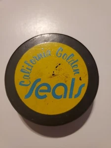 Vintage California Golden Seals NHL vecchio logo disco da hockey  - Foto 1 di 5