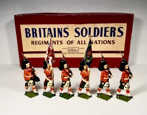BRITAINS SET #2111 Soldatino giocattolo piombo OROLOGIO NERO HIGHLANDERS COLOR PARTY - Foto 1 di 4