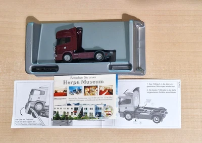 Tracteur routier violet Herpa 145220 SCANIA 144L 580 V8 avec accessoires 1:87 - Photo 1/4