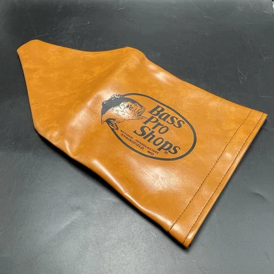 Protector de cubierta de carrete de pesca de vinilo vintage Bass Pro Shops marrón Foto 1 de 4