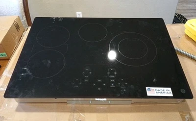 GE JP5030DJ2BB 30" Cocina Eléctrica Control Táctil Negro 4 Elementos Radiantes Foto 1 de 4