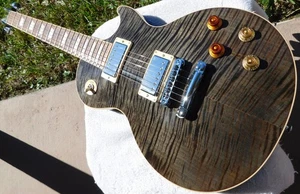 Guitarra Eléctrica Gibson Les Paul Standard Premium Plus Negra Translúcida 2012 - Imagen 1 de 20