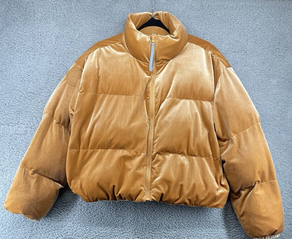 Chaqueta acolchada recortada de terciopelo amarillo miel Fabletics para mujer talla mediana Foto 1 de 4