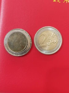Tondello Da 2 Euro Non Coniato Inizio Occhio Di Bue Bordo Trat. Doppia Battitura - Foto 1 di 5