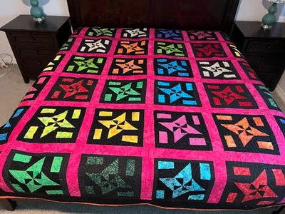 Pink pinwheel on black with orange backing in king size - Image 1 of 4