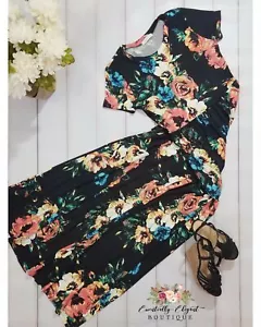 Maxi Vestido Dream A Dream Negro Estampado Floral con Mangas Cortas y Bolsillos - Imagen 1 de 5