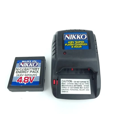 NIKKO 4.8v 1244 4 Hours Ni-CD Slot Slide In Charger w/ Battery - Image 1 of 4