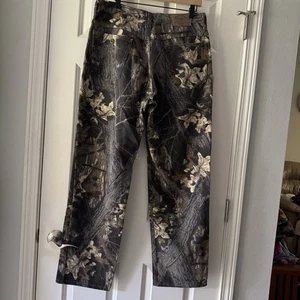 Pantalones de mezclilla de algodón camuflados para hombre Cabela's nuevos sin etiquetas talla 34 x 32 ~ 5 bolsillos **Nuevos** - Imagen 1 de 8