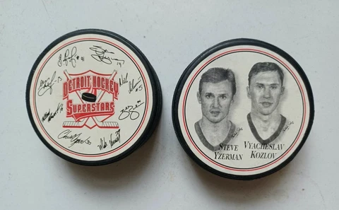 A Pair of Detroit Red Wings Pucks 1997 Burger King Yzerman & Kozlov / SuperStars Cover