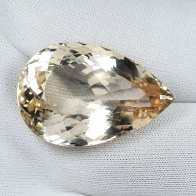 48.34 ct  UNHEATED !   TOP LUSTROUS  - NATURAL CHAMPAGNE TOPAZ See Vdo 3917 CL - Image 1 of 2