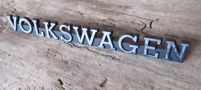 ОРИГИНАЛЬНЫЙ ЗАДНИЙ БАГАЖНИК VOLKWAGEN С ЭМБЛЕМОЙ VOLKWAGEN VOLKSWAGEN JETTA/GOLF MK2 1984-1991 171853685 - Изображение 1 из 4