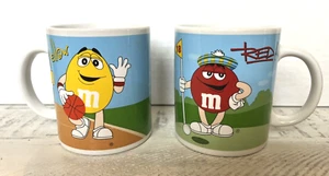 Taza M&M Galería 2002 Azul Rojo Amarillo Verde Golf Fútbol Baloncesto Béisbol x 2 - Imagen 1 de 5