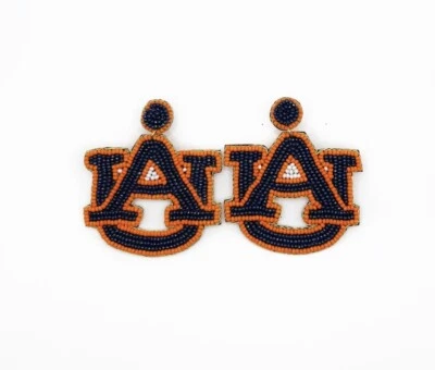 Pendientes llamativos con cuentas castaño rojizo de la Universidad Foto 1 de 2