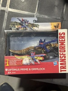 Hasbro Transformers Dino Sparkers Optimus Prime & Grimlock Figures - Picture 1 of 1