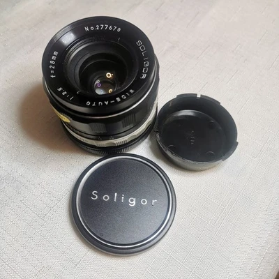Soligor 1:2.8 f=28mm Lens w/ Front & Rear Caps For Canon - Image 1 of 4
