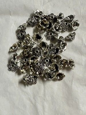55 tapas de cuentas tono plata 8x6 mm para hacer joyas Foto 1 de 2