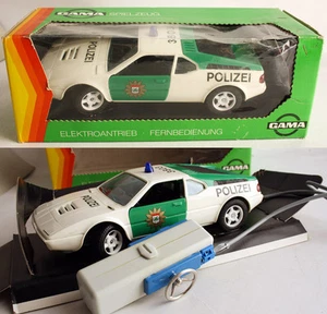 SEHR SELTEN VINTAGE 80ER JAHRE GAMA BMW M1 1:16 POLIZEI FERNBEDIENUNG AUTO NEU NOS! - Bild 1 von 12