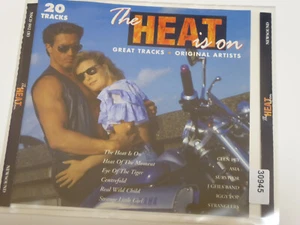 VARIOUS : The Heat Is On  > VG+ (CD) - Bild 1 von 3
