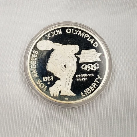 1983 S $1 Olympic Discus Commemorative Silver Dollar - PROOF - 83O1P - STOCK Cover