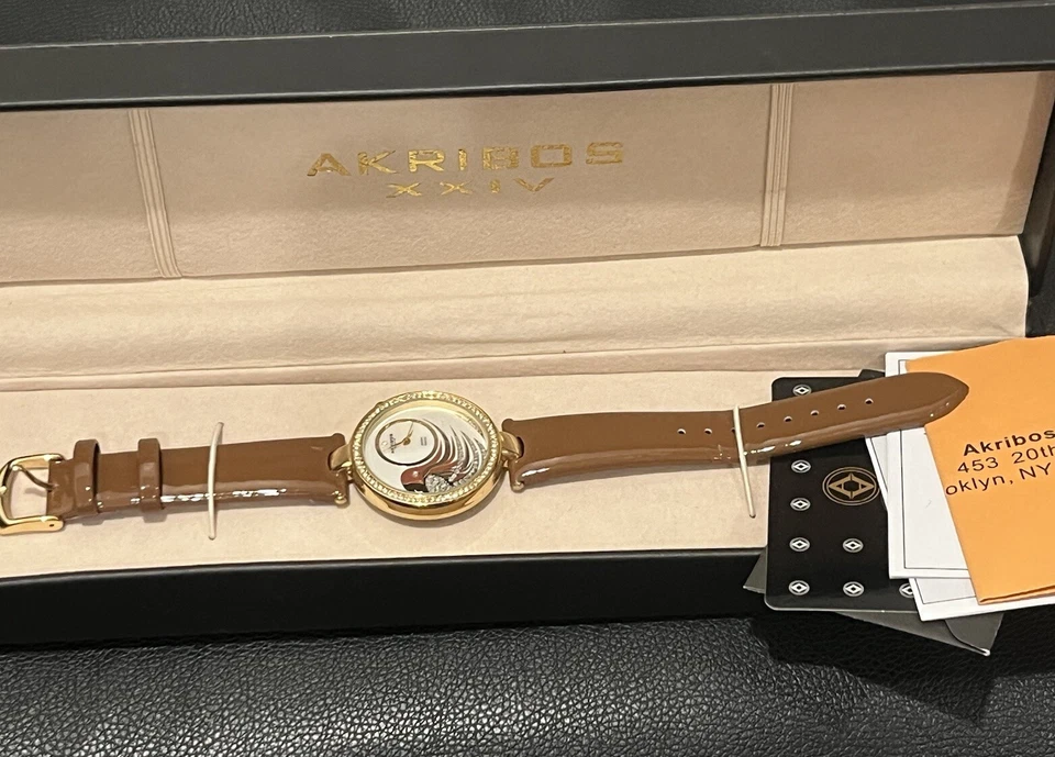 Reloj pulsera para mujer Akribos XXIV esfera loro correa de cuero con detalles de diamantes Foto 1 de 4