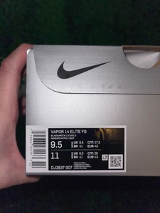 nike tiempo negro con dorado