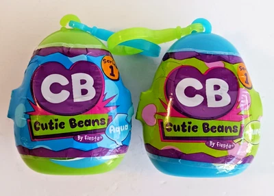 Cutie Beans LOT 1 AQUA + 1 Jungle Blind Capsules  Sealed Series 1 Fiesta 2018 - Image 1 of 4