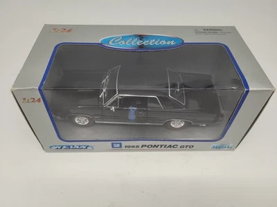 1965 Pontiac GTO 1/24 Scale Diecast Metal Model by Welly - BLACK - Image 1 of 4