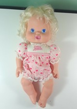 baby doll with cherry spoon
