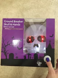Animated Halloween Ground Breaker Skull & Hands Blinking Lights & Motion Sensor - Picture 1 of 4