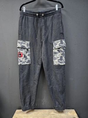 Pantalones deportivos Hugo Boss X Bathing Ape talla mediana bolsillos de carga negros 🔥 Foto 1 de 4
