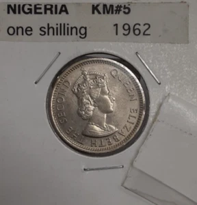 Moneda de 1 chelín de cobre y níquel 1962 Nigeria de la reina Isabel II UNC - Imagen 1 de 2