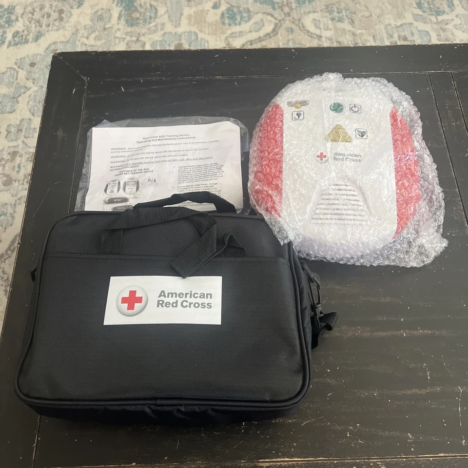 Nuevo Entrenador DEA Cruz Roja Americana con Bolsa de Transporte, Inglés/Español Foto 1 de 4