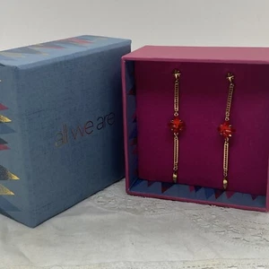 ALL WE ARE Red Star Dangly Earrings Long Gold Plated Retro Kitsch Deco NEW BOXED - Picture 1 of 8