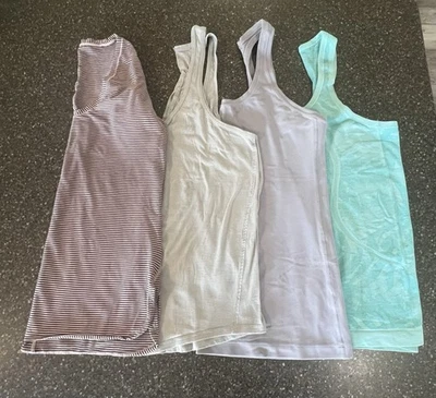 LOTE DE 4 Prendas Activas LULULEMON Talla 10 Prendas para el torso Tanques Gimnasio Yoga Entrenamiento Correr Usadas en Excelente Condición Foto 1 de 4